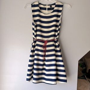 Dark blue and cream stripped dress with red belt, flare at the bottom of dress